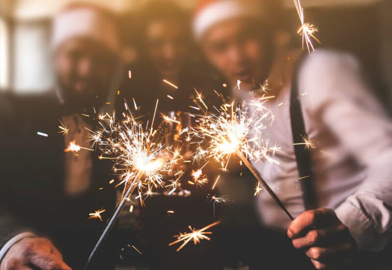 Sparklers,In,The,Foreground.,Beautiful,Young,People,At,A,Corporate